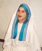 Ava dressed as Bl. Teresa of Calcutta (Mother Teresa) for Third Grade Living Museum. 