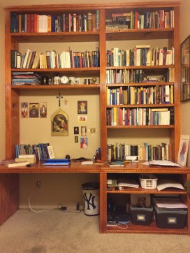 A large section of my personal library. There are other books as well. 