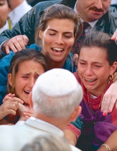 YOUNG WOMEN GREET POPE JOHN PAUL II AT WORLD YOUTH DAY IN 1993